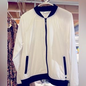 DKNY light jacket , DKNY on back size M retails 99